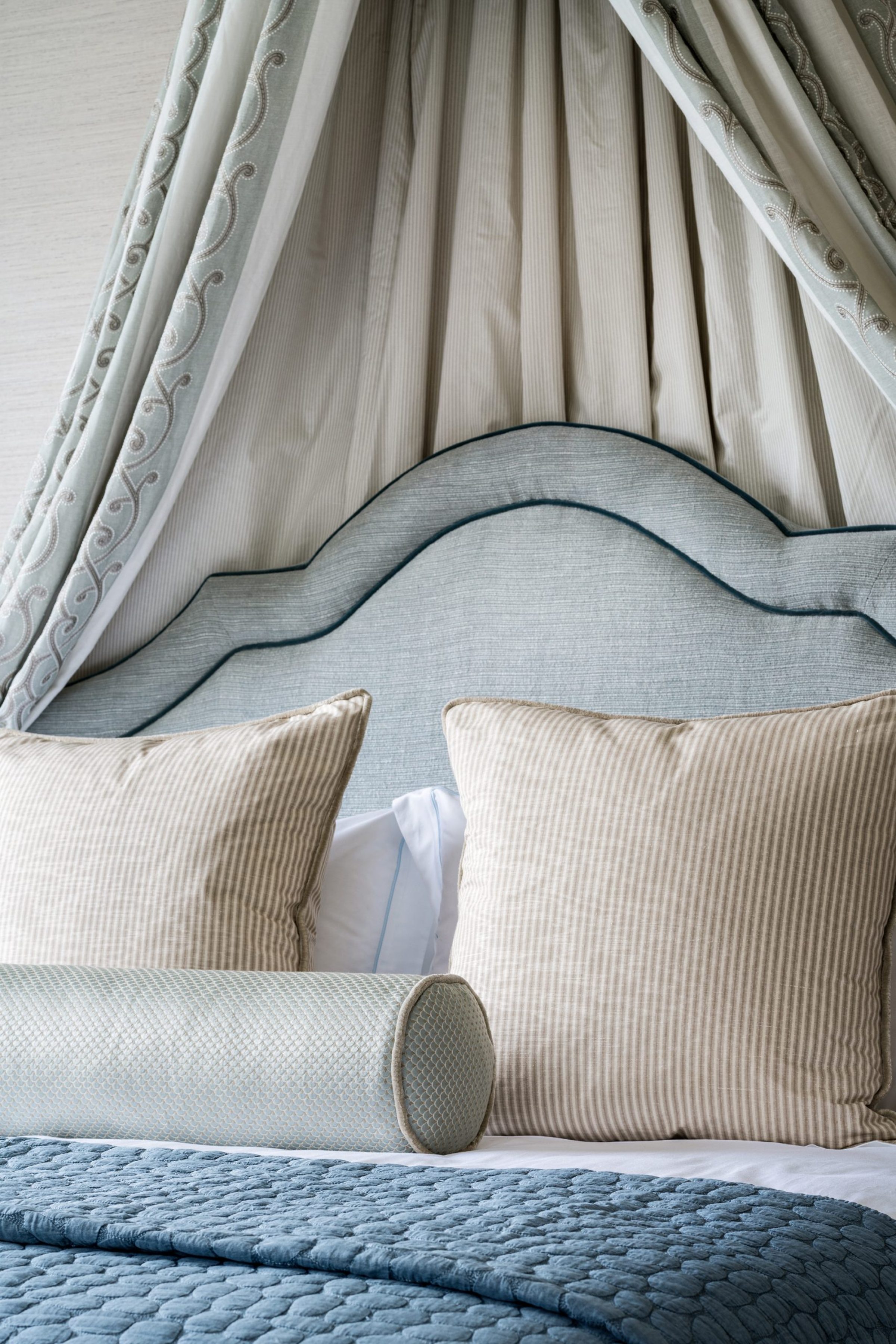 blue piped traditional headboard