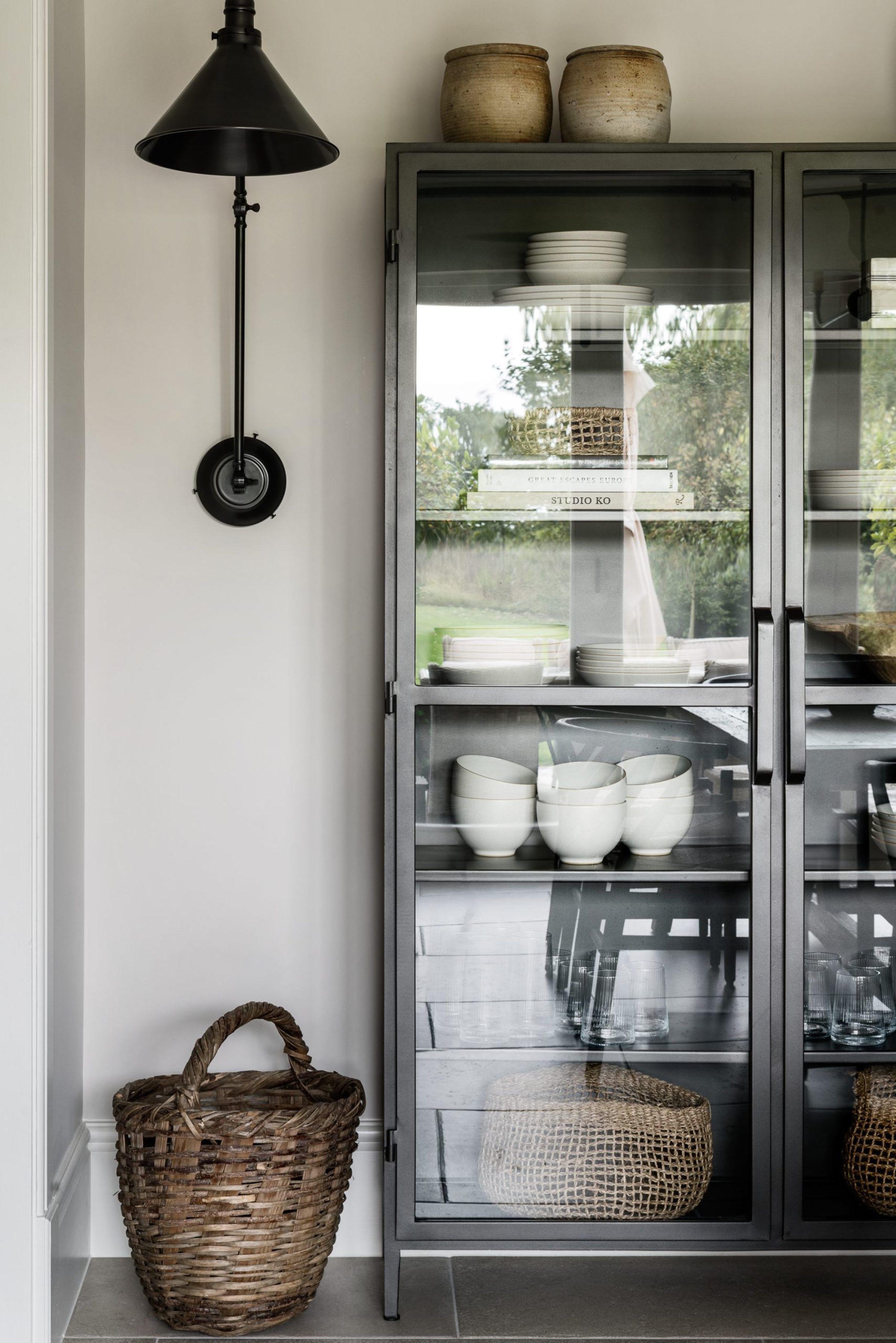 Display cabinet with vintage pieces sourced by our team